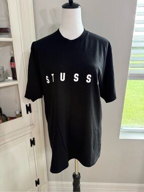 Stussy Black Lens Tee with a large white graphic on the back